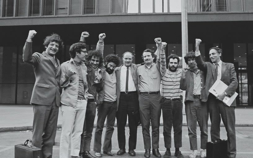 The Chicago Seven defendants and their lawyers outside court in 1969 - David Fenton