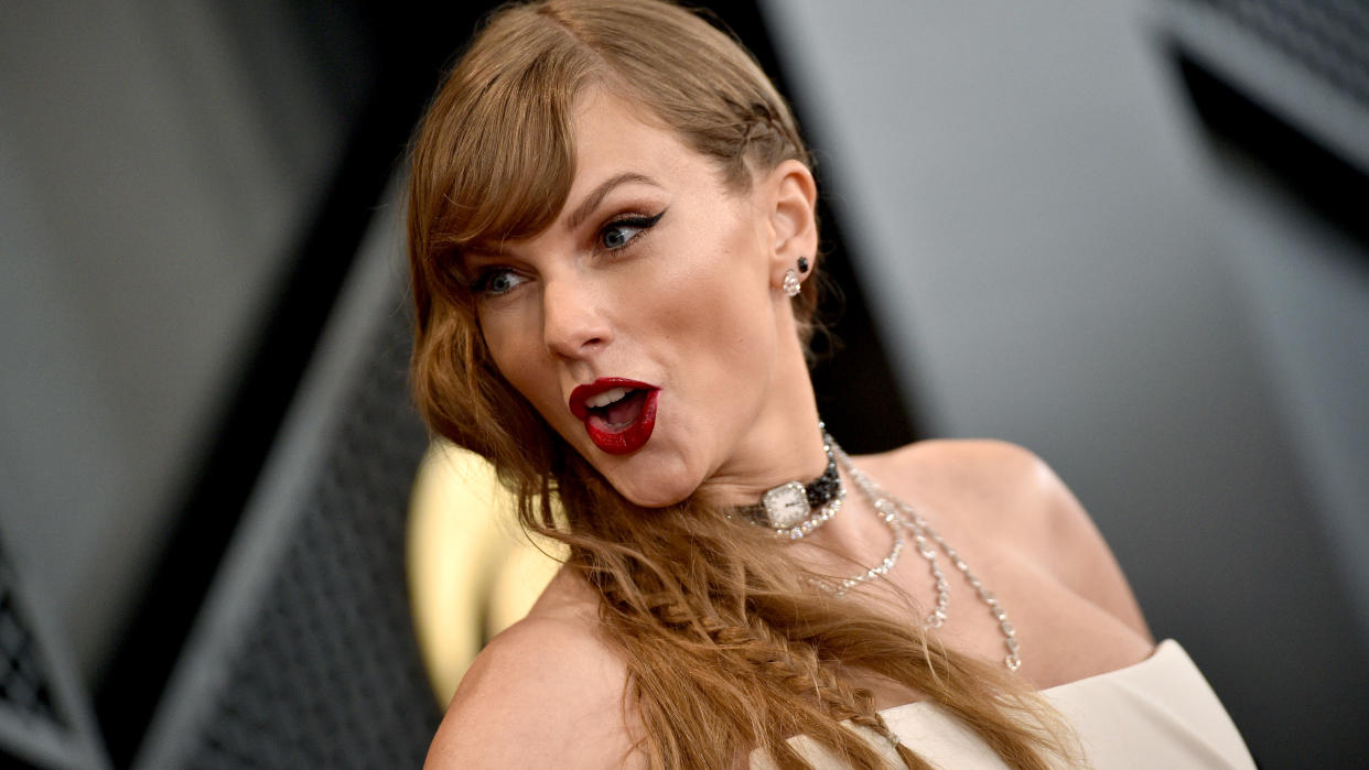  Taylor Swift at the Grammy's wearing a watch choker. 