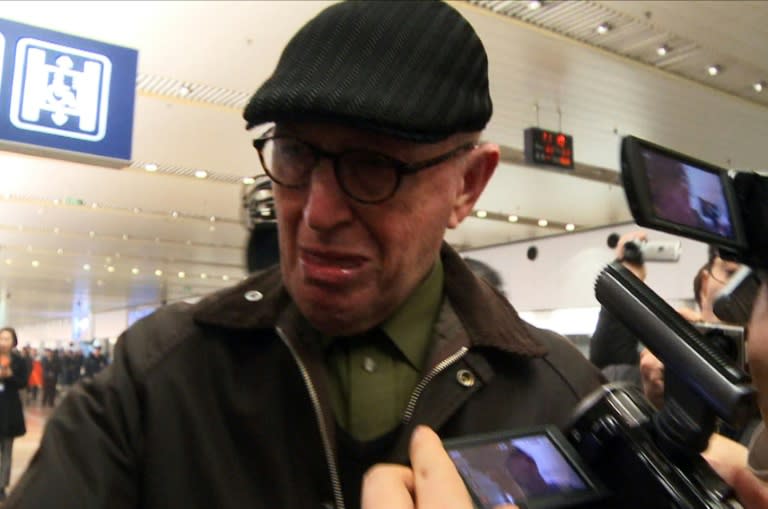 Australian missionary John Short arrives at Beijing international airport on March 3, 2014 following his release from North Korea