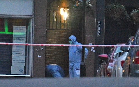 Police forensic officers at the scene in Streatham High Road - Credit: Kirsty O'Connor/PA Wire