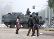 <p>AN armed soldier patrols a street in Harare, Zimbabwe, Wednesday, Nov. 15, 2017. (Photo: AP) </p>