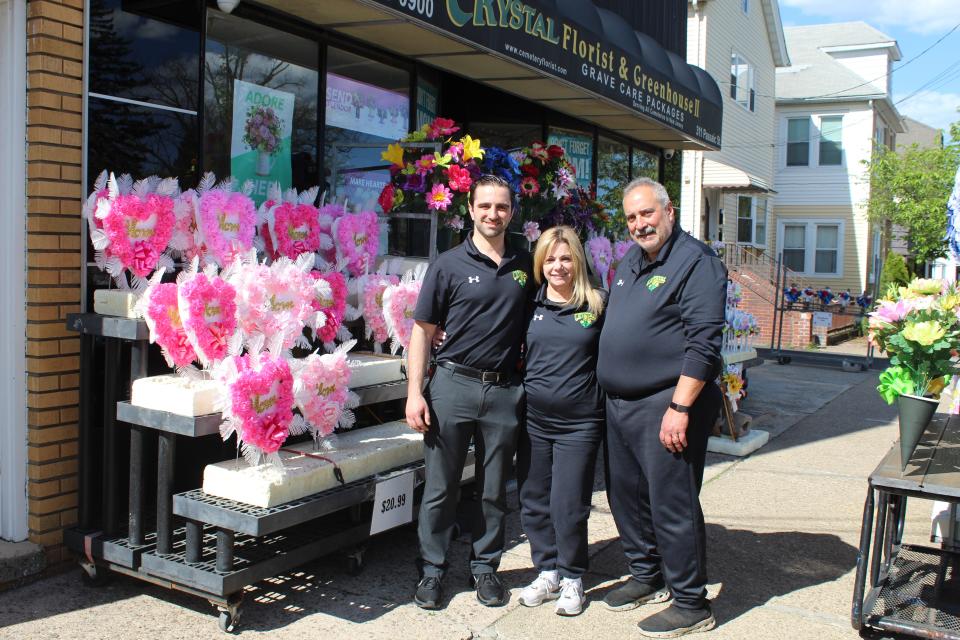 The Maffei's outside of Crystal Florist & Greenhouse in Garfield.