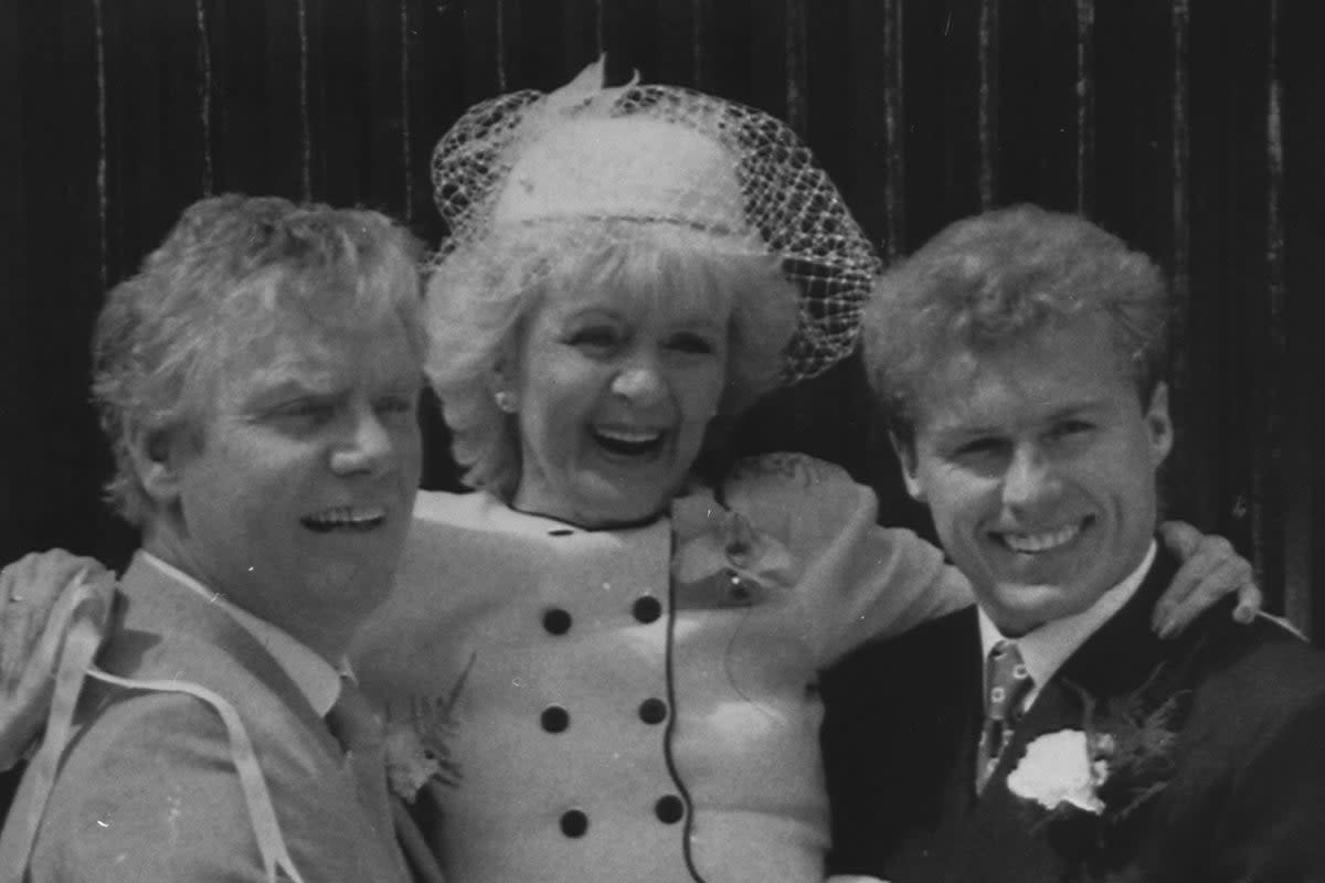 ‘Coronation Street’ bride Ivy Tilsley (played by Lynne Perrie) is given a lift by her groom, Don Brennan (Geoff Hinsliff) and on-screen son Brian (Chris Quinten) (PA)