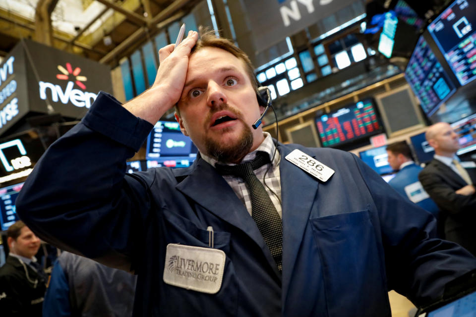 Traders work on the floor of the New York Stock Exchange (NYSE) in New York, U.S., May 1, 2018. REUTERS/Brendan McDermid