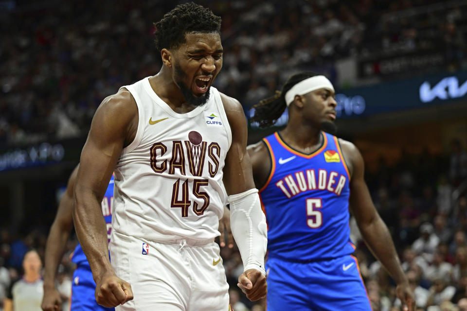 Cleveland Cavaliers guard Donovan Mitchell (45) reacts after being fouled in the second half of an NBA basketball game against the Oklahoma City Thunder, Friday, Oct. 27, 2023, in Cleveland. (AP Photo/David Dermer)