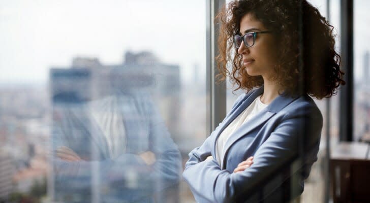 Woman looking out a window