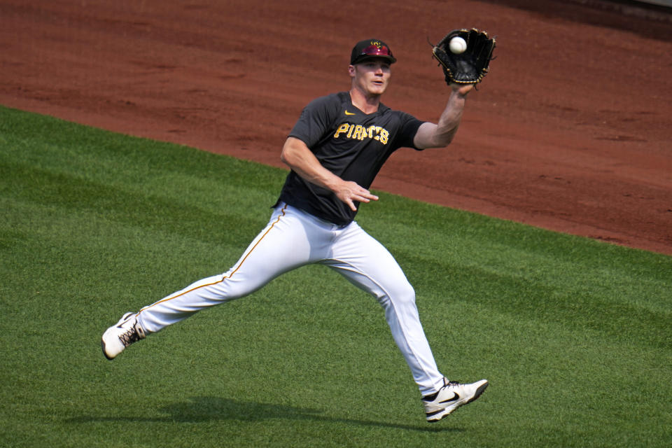 Pittsburgh Pirates 2021 first-round draft pick Henry Davis runs drills in right field at PNC Park after being called up from AAA Indianapolis before a baseball game against the Chicago Cubs in Pittsburgh, Monday, June 19, 2023. (AP Photo/Gene J. Puskar)