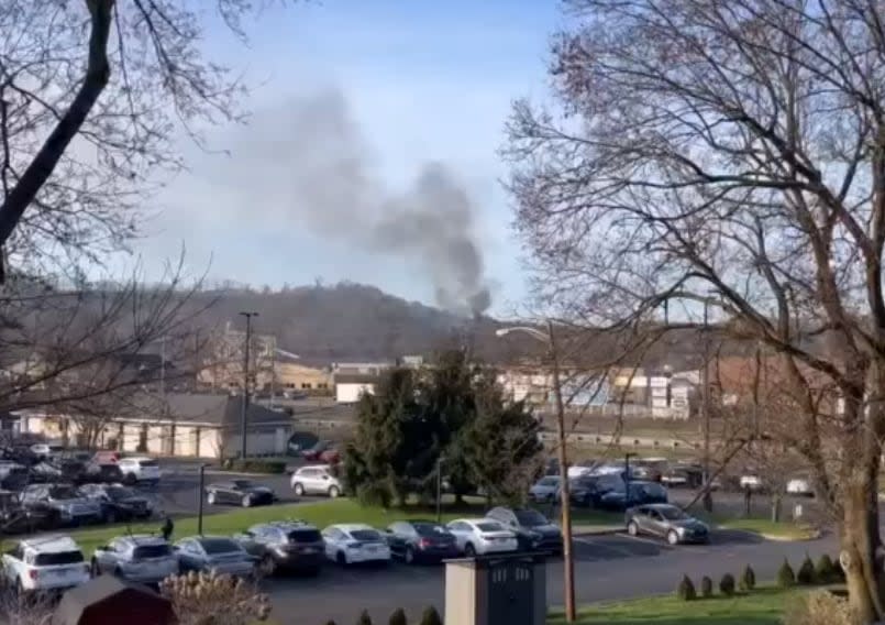 Smoke can be seen from a house explosion in Crescent Township.