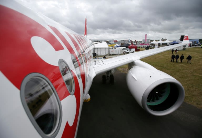 The Bombardier CS100 passenger jet is pictured on the opening day of the Farnborough Airshow, south west of London, on July 11, 2016