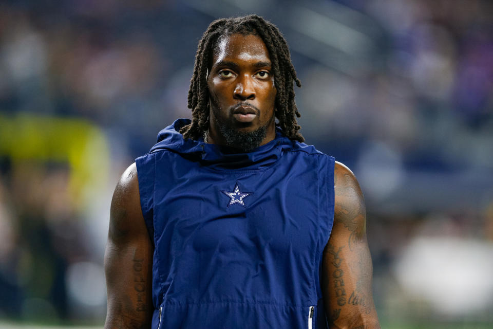 DeMarcus Lawrence stars ahead during pregame warmups. 