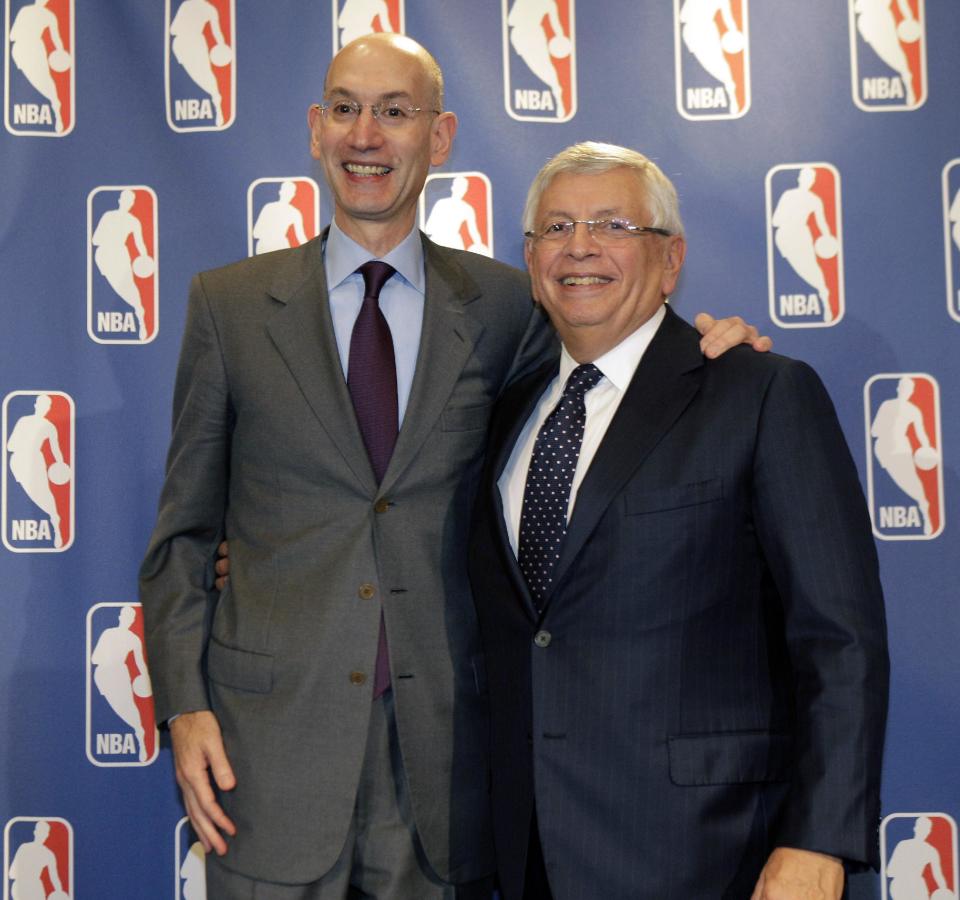 NBA Deputy Commissioner Adam Silver, left, poses for a photograph with Commissioner David Stern during a basketball news conference following Board of Governors meetings in New York, Thursday, Oct. 25, 2012. Stern announced he will retire on Feb. 1, 2014, 30 years after he took charge of the league. He will be replaced by Silver. (AP Photo/Kathy Willens)