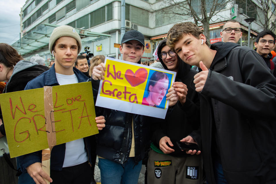 Demonstrators and show placards of Greta Thunberg during 1st Anniversary Climate Strike in Lausanne, Switzerland.