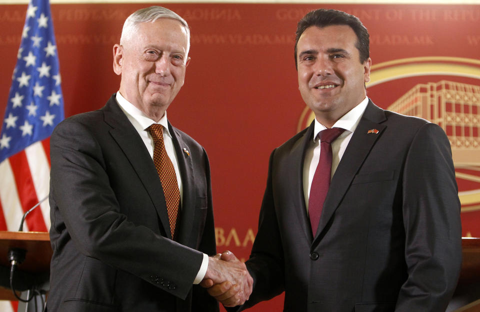 U.S. Defense Secretary James Mattis, left, shakes hands with Macedonian Prime Minister Zoran Zaev, right, during their meeting at the government building in Skopje, Macedonia, Monday, Sept. 17, 2018. Mattis arrived in Macedonia Monday, condemning Russian efforts to use its money and influence to build opposition to an upcoming vote that could pave the way for the country to join NATO, a move Moscow opposes. (AP Photo/Boris Grdanoski)