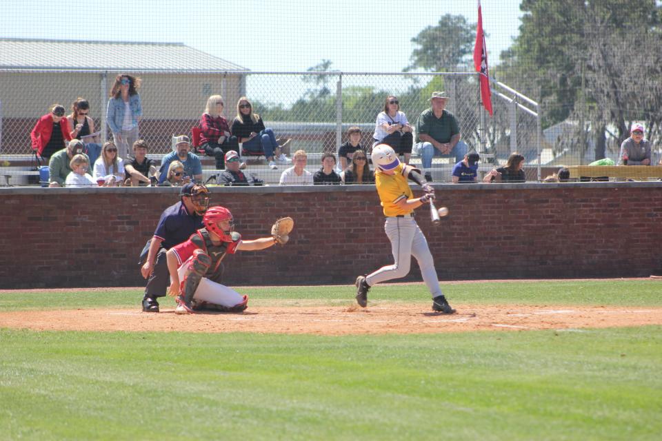 Calvary's Caden Arnold connects for a double to left field in a win at Savannah Christian on March 29, 2024.