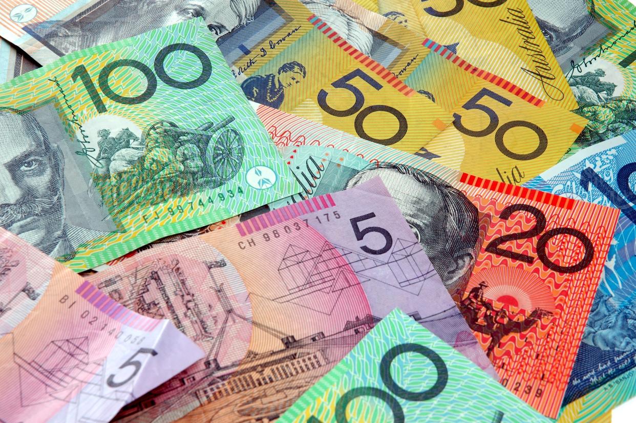 Australian notes scattered on a table. Click to see more...