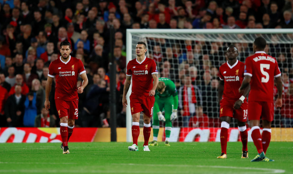 Liverpool’s Emre Can, Dejan Lovren and Sadio Mane looks dejected after conceding the first goal