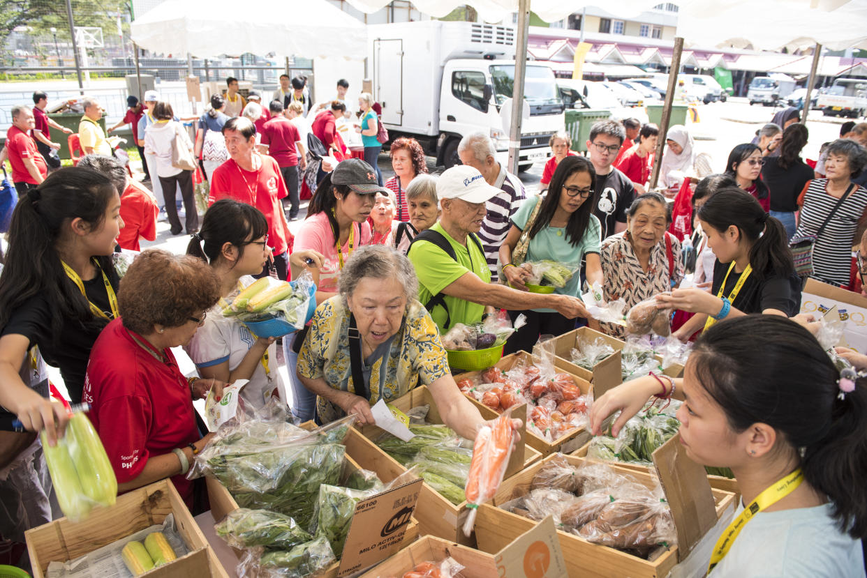 Beneficiaries redeeming food items at the pop-up market on 20 March, 2019. (PHOTO: Food from the Heart)