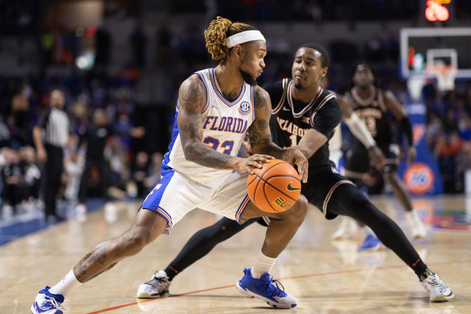 Florida guard Brandon McKissic (23) dribbles the ball during the first half against OSU's Bryce Thompson.