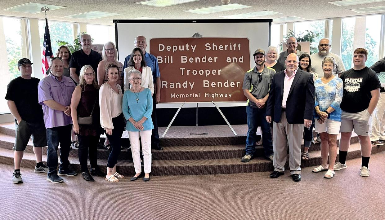 Family members of Deputy Bill Bender and Trooper Randy Bender gathered for the ceremony on Friday, July 15, 2022, that dedicated a part of Ohio 309 in Marion County to the memory of the two local law enforcement officers who gave their lives in the line of duty. The portion of Ohio 309 between Marion-Williamsport and Holland roads has been designated as the "Deputy Sheriff Bill Bender and Trooper Randy Bender Memorial Highway." Rep. Tracy Richardson, R-Marysville, and Rep. Riordan McClain, R-Upper Sandusky, were co-sponsors of House Bill 291, which included the designation.