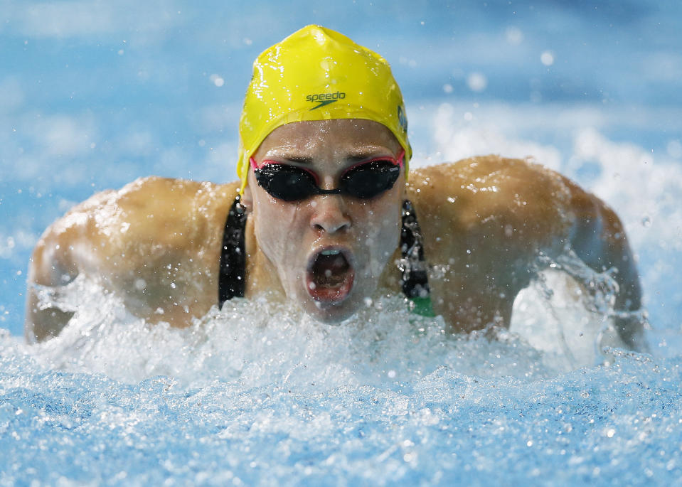 FILE - In this July 28, 2014, file photo, Maddie Groves of Australia swims to win silver in the Women's 200m Butterfly final at the Tollcross International Swimming Centre during the Commonwealth Games 2014 in Glasgow, Scotland. Cody Simpson was dominating attention ahead of Australia’s Olympic swimming trials, until Groves pulled out of the six-day meet following a series of social media posts condemning “misogynistic perverts” in the sport. (AP Photo/Kirsty Wigglesworth, File)