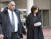 Former Baltimore mayor Catherine Pugh, right, leaves U.S. District Court in Baltimore on Thursday, Nov. 21, 2019. An 11-count federal indictment accuses Pugh of arranging fraudulent sales of her "Healthy Holly" books to schools, libraries and a medical system to enrich herself, promote her political career and fund her run for mayor. (AP Photo/Steve Ruark)