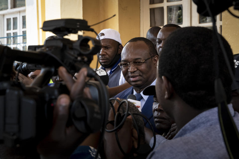 Presidential challenger Anicet-Georges Dologuele speaks to the media after casting his vote at the town hall polling station in the capital Bangui, Central African Republic Sunday, Dec. 27, 2020. Voting has begun in Central African Republic's presidential and legislative elections after a campaign period marked by violence between rebels and government forces. (AP Photo)