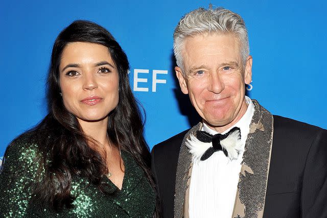 <p>Donato Sardella/Getty</p> Mariana Teixeira De Carvalho and Adam Clayton in Beverly Hills in January 2016