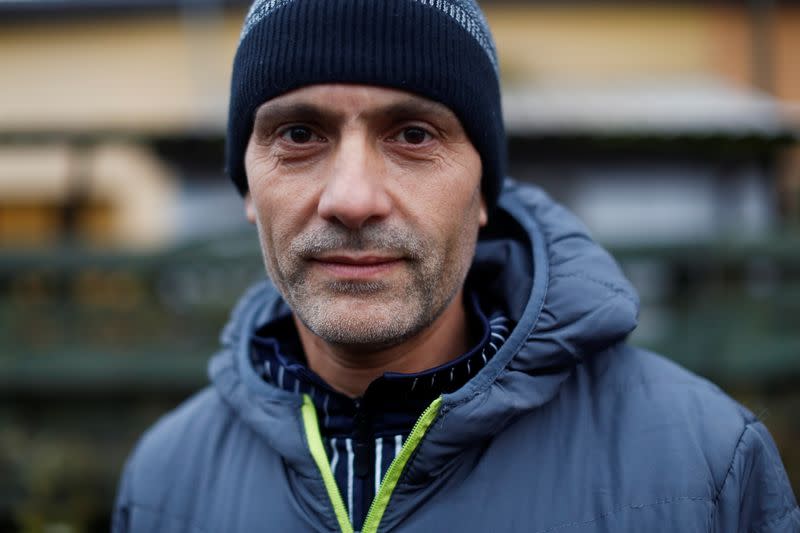 Migrant from Syria poses for a picture in front of The Fundacja Dialog Center in Bialystok