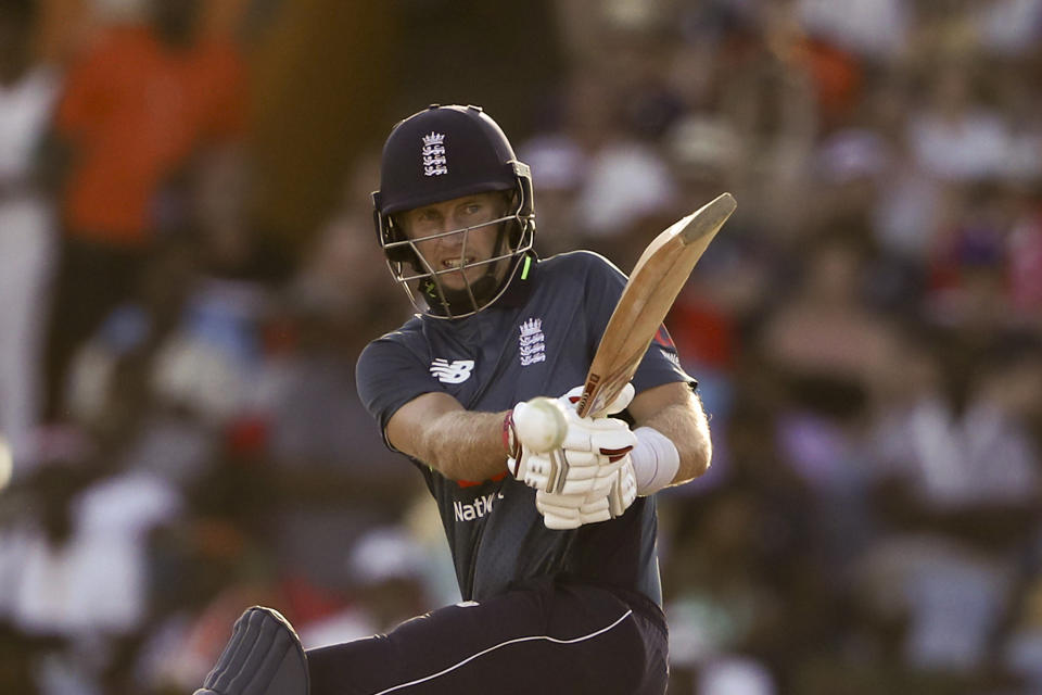 England's Joe Root plays a shot against West Indies during the first One Day International cricket match at the Kensington Oval in Bridgetown, Barbados, Wednesday, Feb. 20, 2019. (AP Photo/Ricardo Mazalan)