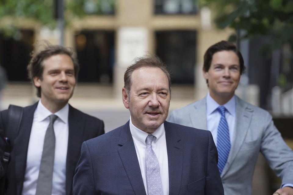 US Actor Kevin Spacey, center, arrives at Southwark Crown Court, London, Tuesday, July 4, 2023. Spacey is charged with three counts of indecent assault, seven counts of sexual assault, one count of causing a person to engage in sexual activity without consent and one count of causing a person to engage in penetrative sexual activity without consent between 2001 and 2005. (Lucy North/PA via AP)