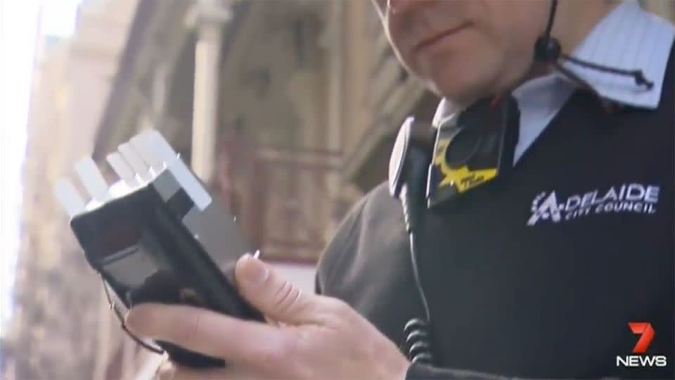 Adelaide parking inspectors were among the first to undertake a trial with the body worn cameras after officers said they felt unprotected. Source: 7 News