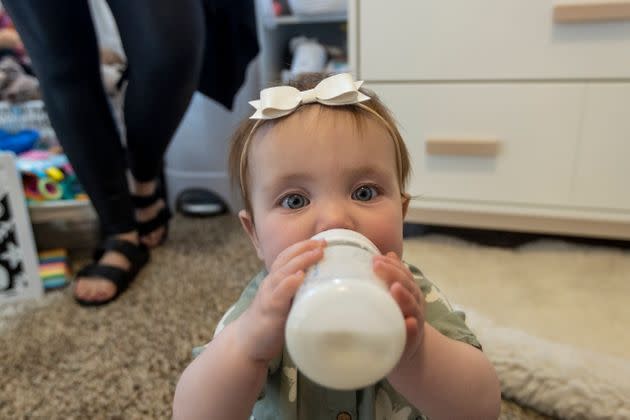 Nine-month-old Olivia Wetzel enjoys a bottle of formula on May 16 in Victor, Idaho. Olivia's mother, Mollie Wetzel, sourced some formula on a community Facebook page where a mother with extra formula was offering what she no longer needed to anyone in need due to the current shortage. (Photo: Natalie Behring via Getty Images)