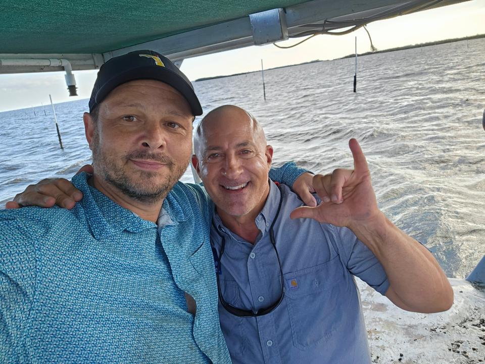 Michael Presley Bobbitt and The Weather Channel's Jim Cantore out on the water.