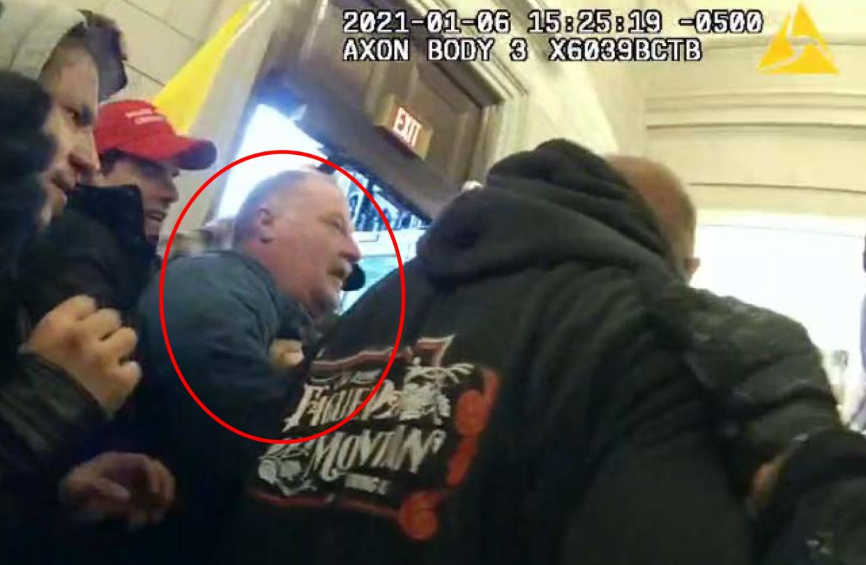 Joseph Fischer, circled, is seen in photos that were part of an FBI arrest warrant. Joseph Fischer, a former police officer in central Pennsylvania, faces seven charges including disorderly conduct and impeding police officers in the Capitol riot on Jan. 6, 2021. “It might get violent,” Fischer wrote in a series of texts about his plans for Jan. 6, according to court records. Fischer made it inside the Rotunda before police pepper-sprayed him and he left, according to court records. He spent less than 4 minutes inside the Capitol.