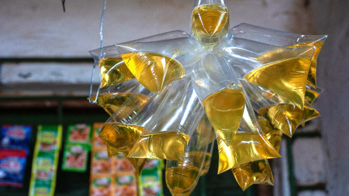 Cooking oil in sachets in a market in Lilongwe, Malawi - Wednesday 16 March 2022