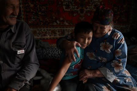 The Wider Image: Russian village's last teacher stays on for her one remaining pupil