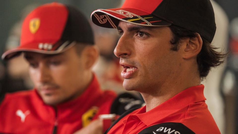 Carlos Sainz speaking, sitting next to Ferrari team-mate Charles Leclerc, Bahrain March 2022 Credit: Alamy