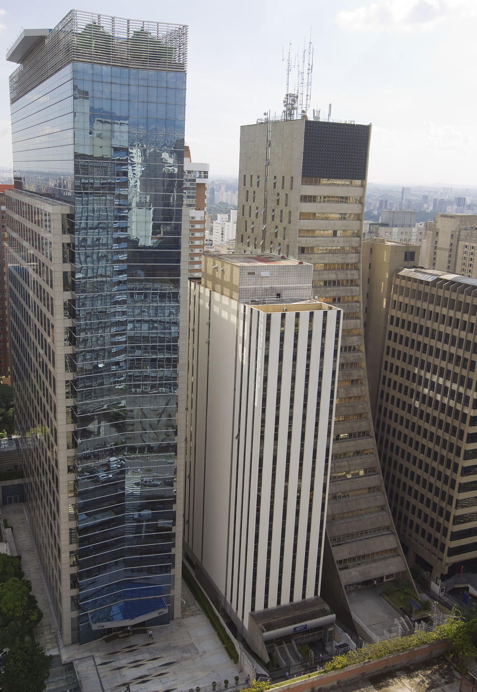 Office buildings are seen in Sao Paulo, Brazil, Wednesday, March 14, 2012. A just-released report prepared by American consulting firm KPMG and France's Greater Paris Investment Agency shows that Sao Paulo now beats out New York as the top destination for foreign investments in the Americas. (AP Photo/Andre Penner)