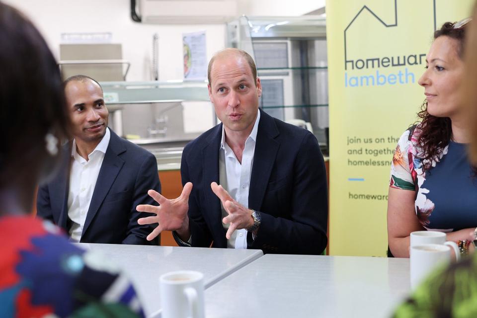 <p>Chris Jackson/Getty Images</p> Prince William, Prince of Wales speaks with members during his visit to Mosaic Clubhouse on June 26, 2023 in London