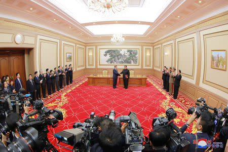 South Korean President Moon Jae-in and North Korean leader Kim Jong Un shake hands after signing a joint statement in Pyongyang in this photo released by North Korea's Korean Central News Agency (KCNA) on September 20, 2018. KCNA via REUTERS