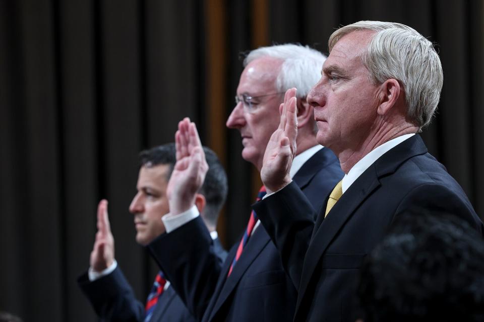 Steven Engel, former Assistant Attorney General for the Office of Legal Counsel, Jeffrey Rosen, former Acting Attorney General, and Richard Donoghue, former Acting Deputy Attorney General, are sworn-in as they testify before the House Select Committee to Investigate the January 6th Attack on the U.S. Capitol in the Cannon House Office Building on June 23, 2022 in Washington, DC. The bipartisan committee, which has been gathering evidence for almost a year related to the January 6 attack at the U.S. Capitol, is presenting its findings in a series of televised hearings. On January 6, 2021, supporters of former President Donald Trump attacked the U.S. Capitol Building during an attempt to disrupt a congressional vote to confirm the electoral college win for President Joe Biden.