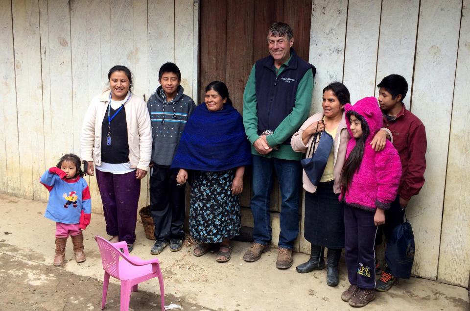 John Rosenow with the family of employee Roberto Tecpile at their home in rural Mexico in January of 2017. Rosenow made the cultural immersion trip with a program sponsored by Puentes/Bridges, Inc., to meet his employees' families and learn more about their lives. (Photo: Courtesy John Rosenow)