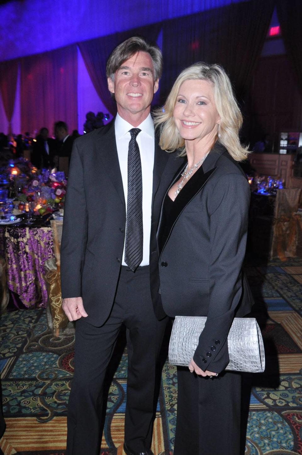 Olivia Newton-John and husband John Easterling at the Love and Hope Ball at the Diplomat Hotel in Hollywood, Florida in a file photo from February 2009. The night was a benefit for the Diabetes Research Institute.