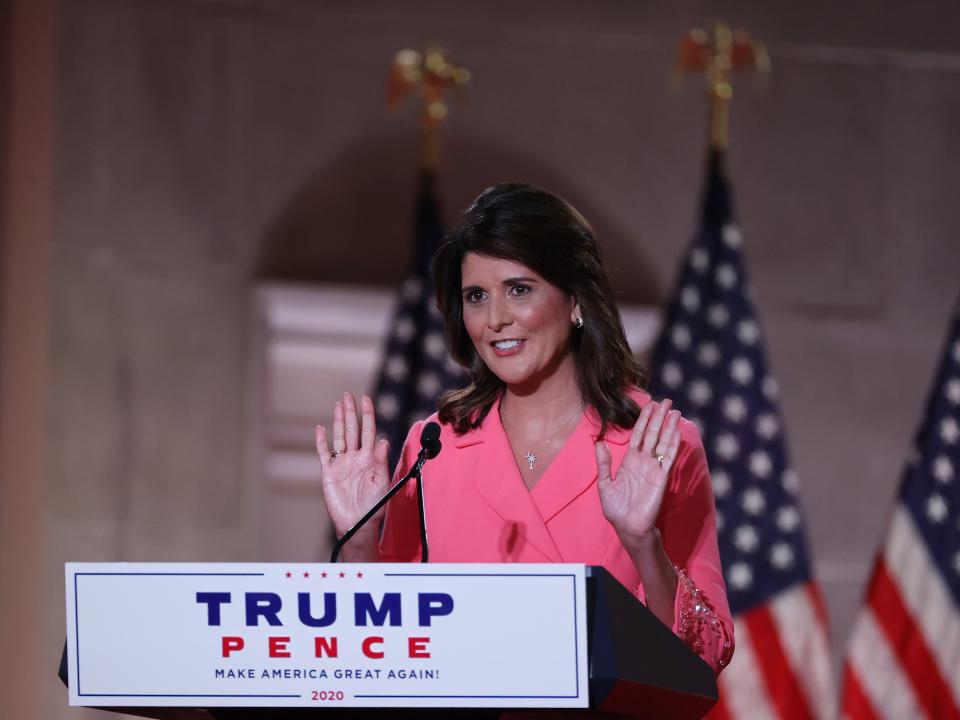 <p>Former US Ambassador to the United Nations Nikki Haley stands on stage in an empty Mellon Auditorium while addressing RNC at the Mellon Auditorium on 24 August 2020 in Washington, DC.</p> ((Getty Images))