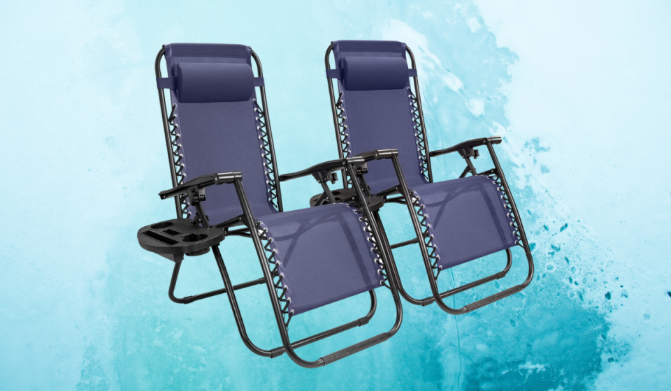 two blue lounge chairs with cupholders