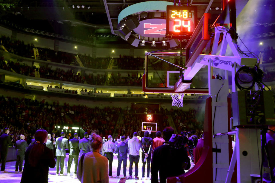 Nebraska and Michigan note the passing of Kobe Bryant before an NCAA college basketball game in Lincoln, Neb., Tuesday, Jan. 28, 2020. (AP Photo/Nati Harnik)