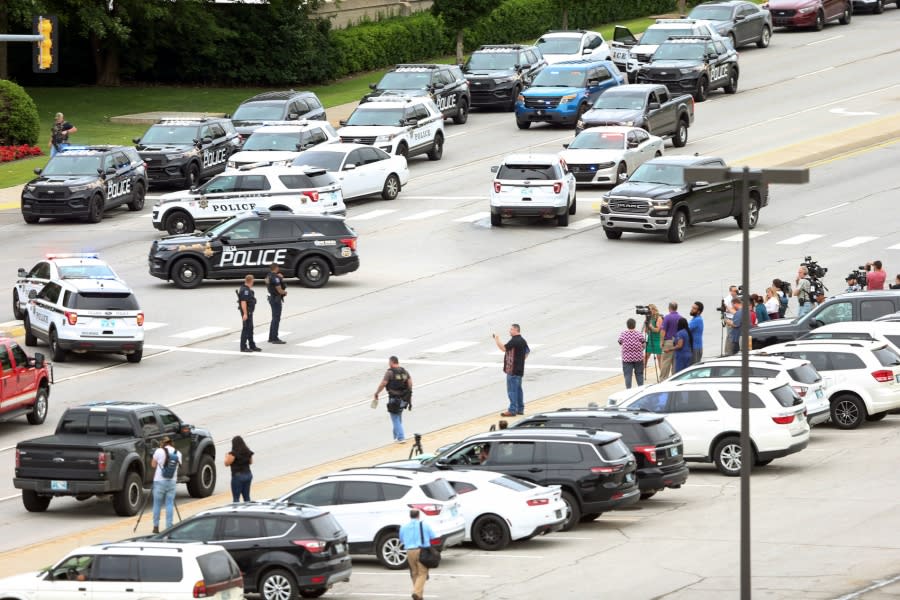 Tulsa police respond to a shooting at the Natalie Medical Building Wednesday, June 1, 2022. in Tulsa, Okla. Multiple people were shot at a Tulsa medical building on a hospital campus Wednesday. (Ian Maule/Tulsa World via AP)