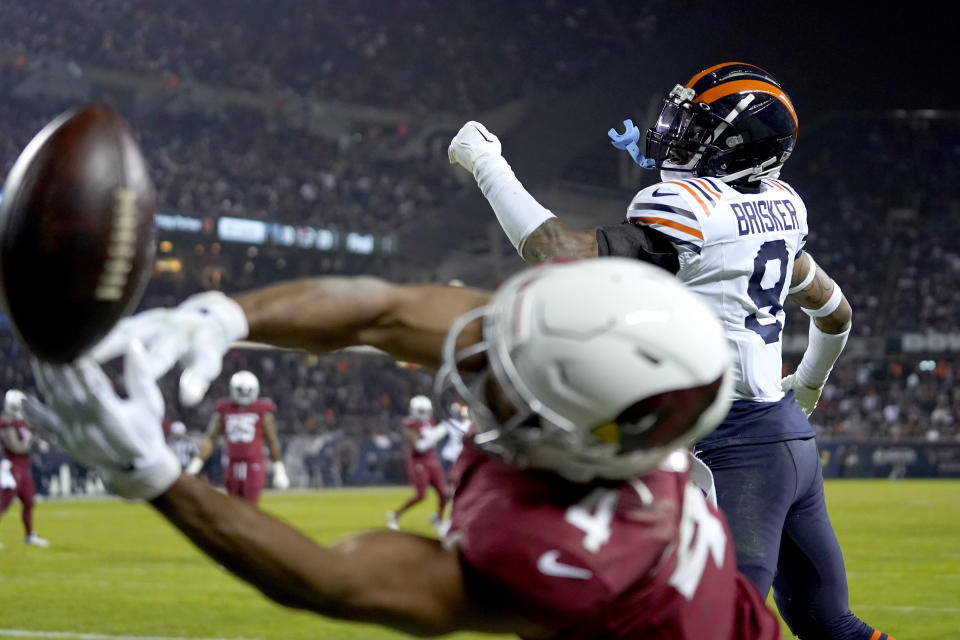 Chicago Bears safety Jaquan Brisker looks back as Arizona Cardinals wide receiver Rondale Moore is unable to catch a pass from quarterback Kyler Murray during the second half of an NFL football game Sunday, Dec. 24, 2023, in Chicago. (AP Photo/Erin Hooley)