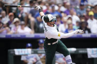 Colorado Rockies' Kris Bryant strikes out against Los Angeles Dodgers starting pitcher Tony Gonsolin to end the fifth inning of a baseball game Sunday, July 31, 2022, in Denver. (AP Photo/David Zalubowski)