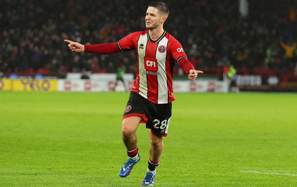 James McAtee of Sheffield United celebrates scoring the winning goal during the Premier League match between Sheffield United and Brentford FC at Bramall Lane on December 09, 2023 in Sheffield, England